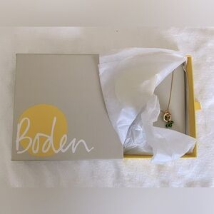 Boden Necklace with Circular Pendant and Green Charms